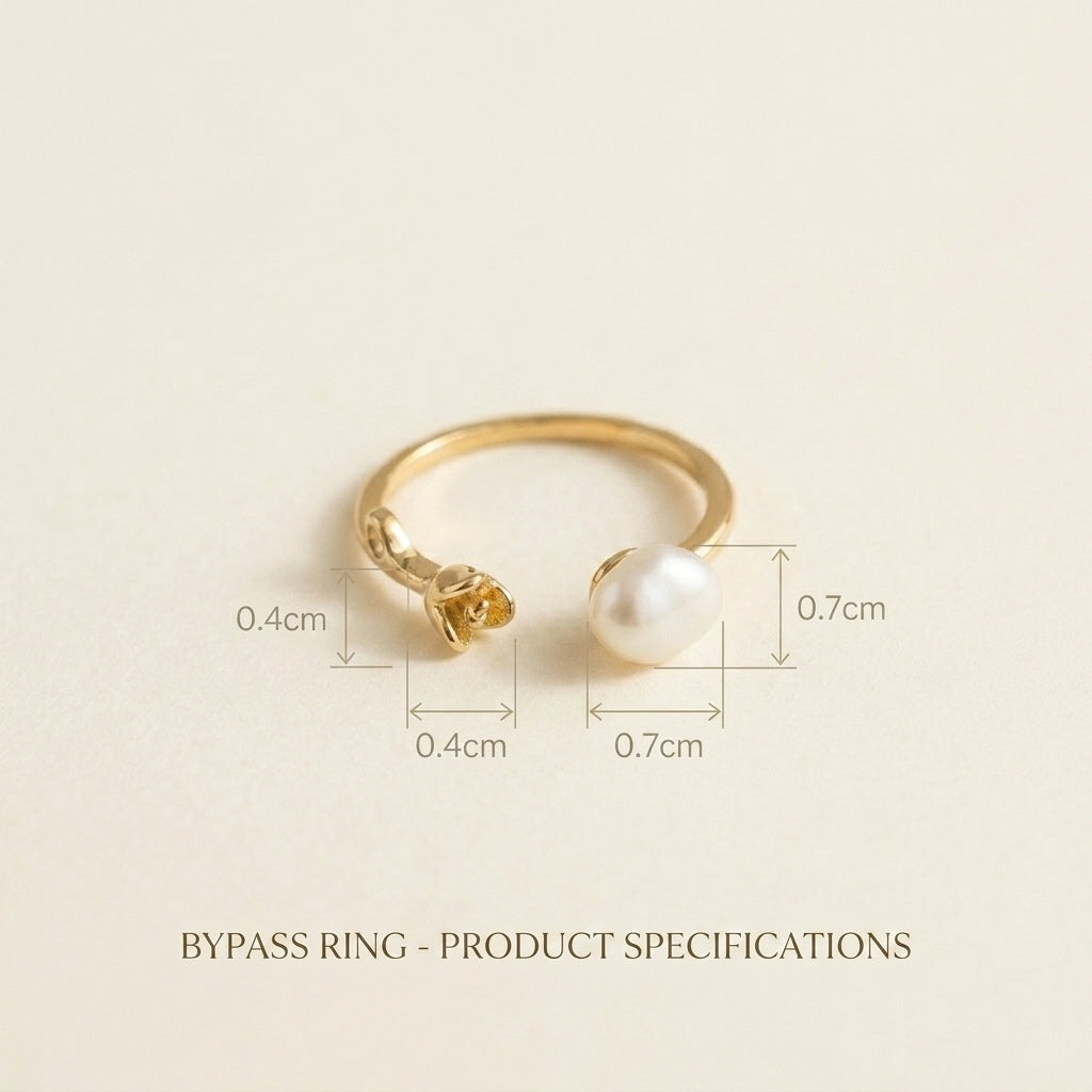 Clear product shot of The 'Rosalie' adjustable open band ring, featuring a 14K gold rose and a genuine unique baroque pearl.