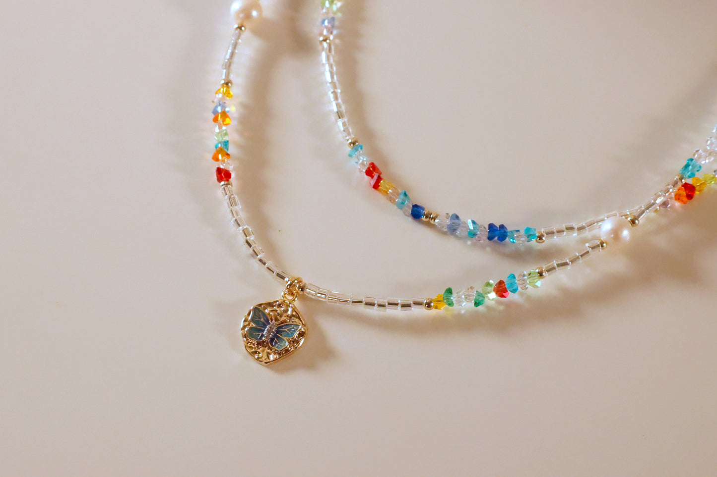 Colorful seed bead double layer necklace with butterful pandant