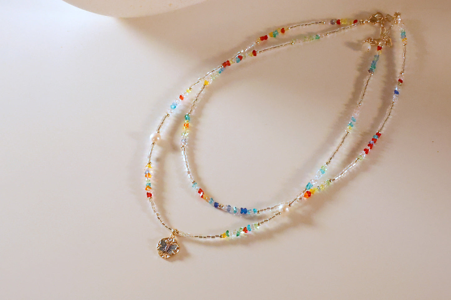 Colorful seed bead double layer necklace with butterful pandant