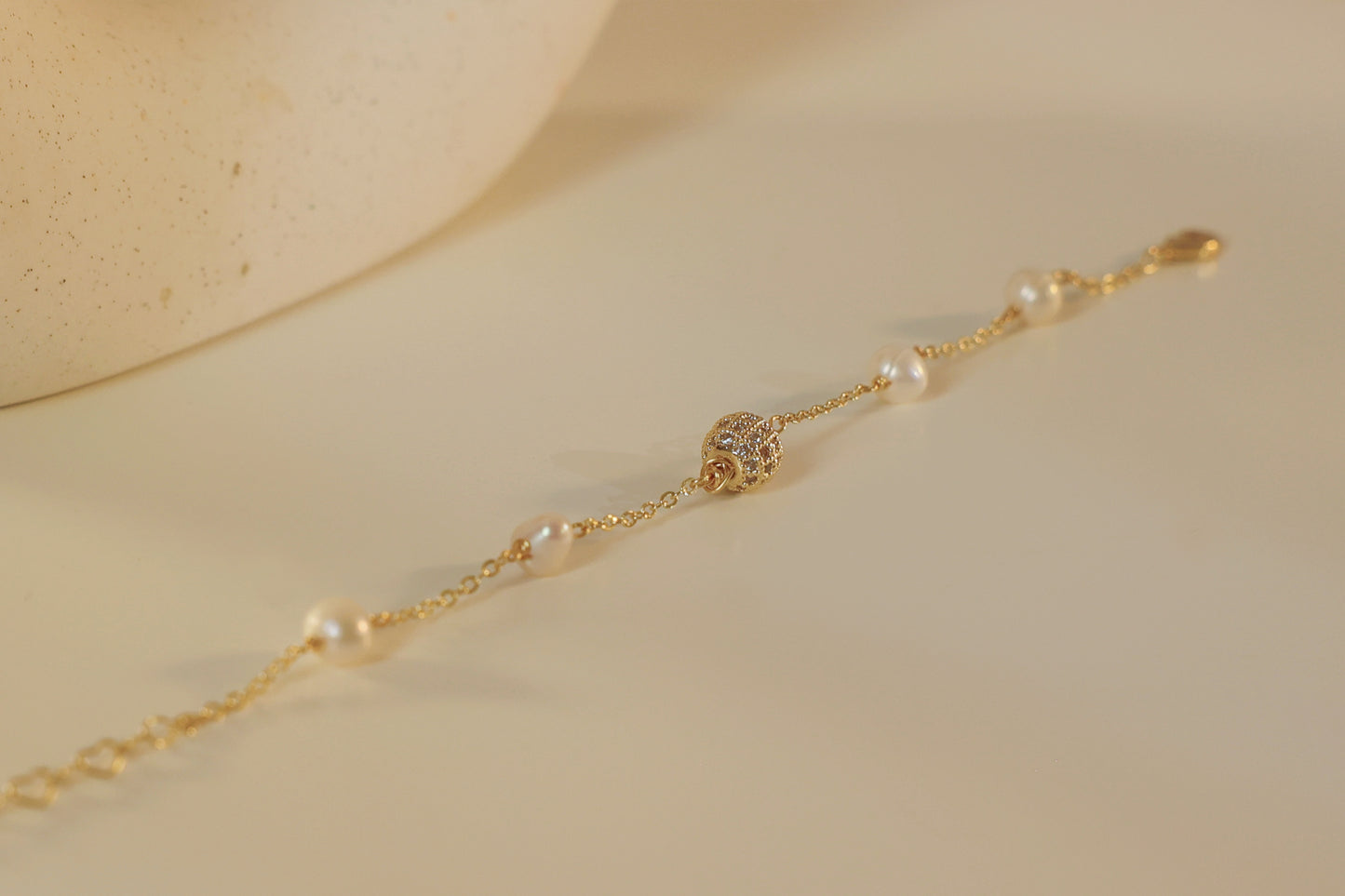 Pearl Satellite Bracelet with Gold CZ disco ball