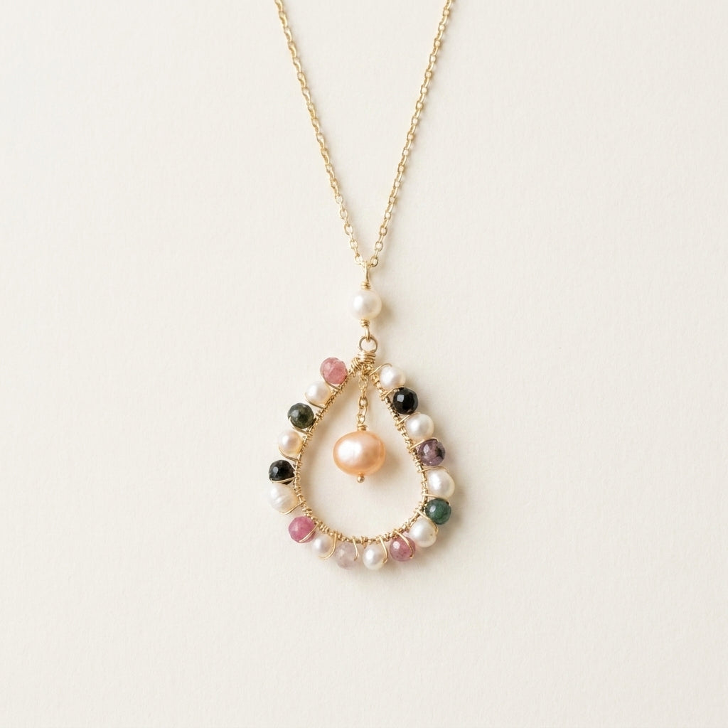 Necklace with multicolored beads on a light background