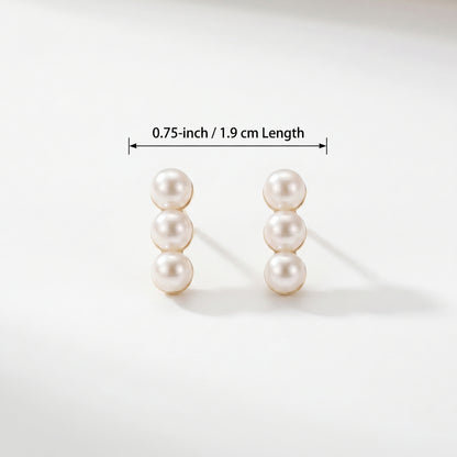 Size guide and dimension diagram for the Lumina Trio three-pearl linear stud earrings.