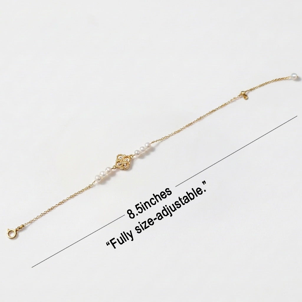 Size guide and length dimensions for the adjustable Aurelia vintage pearl charm bracelet.