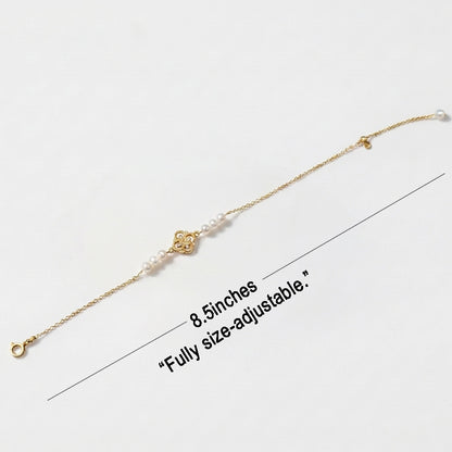Size guide and length dimensions for the adjustable Aurelia vintage pearl charm bracelet.