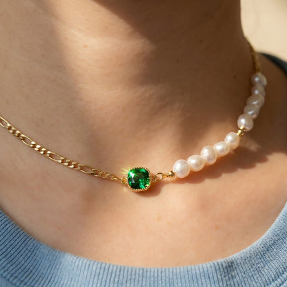 Model wearing the emerald and pearl figaro choker for a minimalist bridal shower look