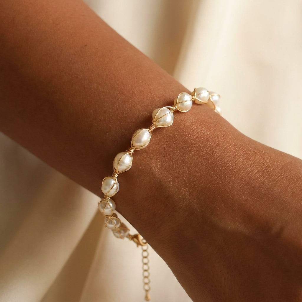 Detailed view of the Seraphina pearl bracelet on a model's wrist - minimalist daily wear