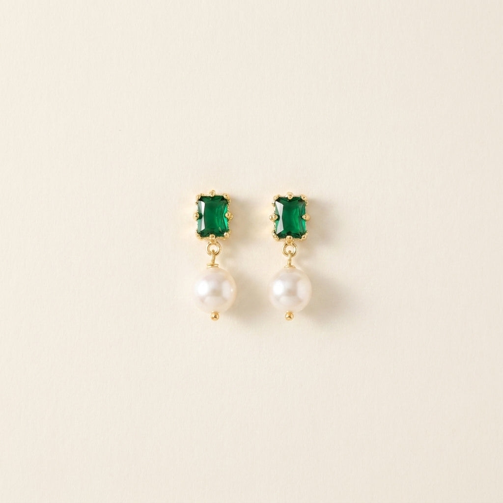 “Eden’s Whisper” Emerald and Freshwater Pearl Drop Earrings on a minimalist beige background