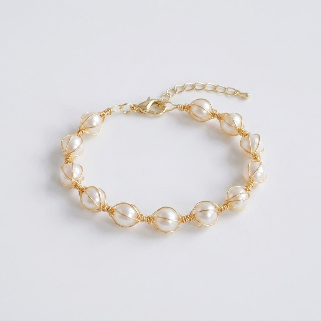 Close-up shot of the natural freshwater pearls and tiny gold beads on the bracelet