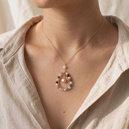 Video showcasing the delicate movement, natural stone colors, and light handmade details of the Pastel Dewdrop necklace.