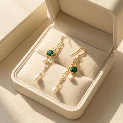 “Verdant Muse” Emerald and Freshwater Pearl Drop Earrings presented in a premium cream jewelry gift box