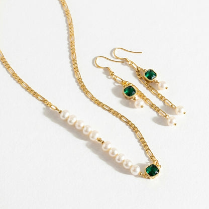 “Verdant Muse” Jewelry Set featuring Emerald and Pearl Drop Earrings with a matching Figaro chain necklace in 14K gold